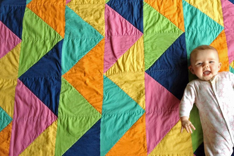 Baby on Gingercake Triangle Quilt